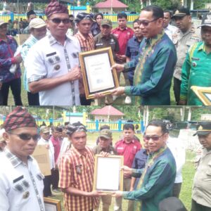 Kunker di Kecamatan Siotapina, Pj Bupati Buton Beri Penghargaan Dua Kepala Desa